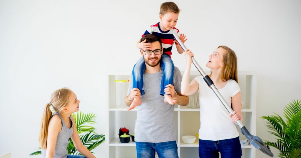 family members cleaning with kids involved